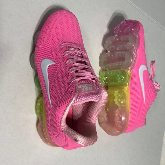 pink nikes with rainbow bottom